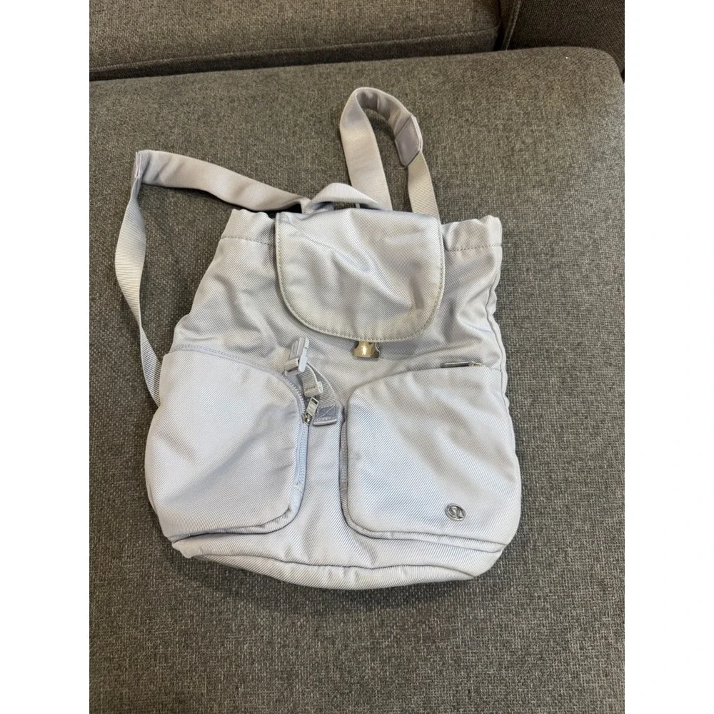 Lululemon Athletica Light Grey Drawstring Flap Backpack Silver Sport Bag